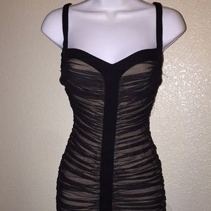 Nude and black dress